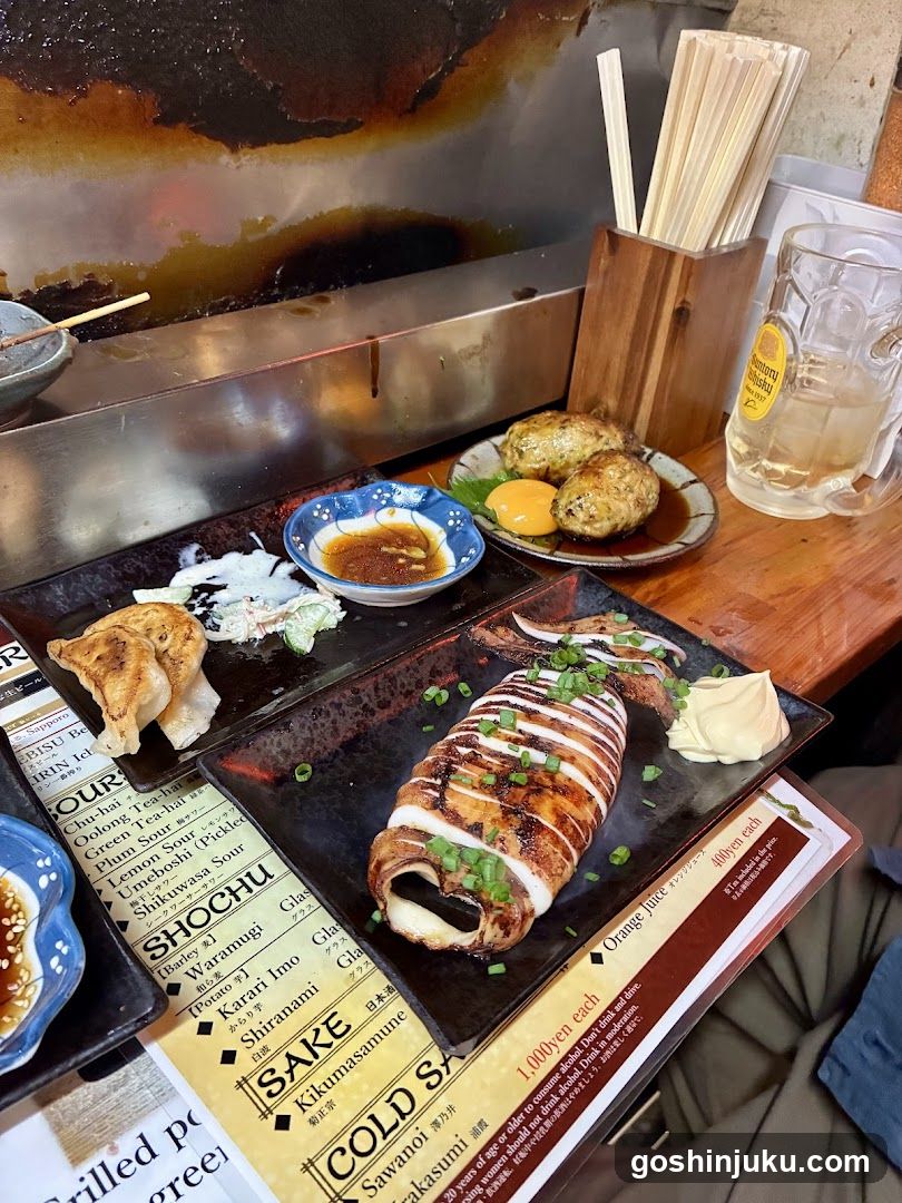 Grilled Squid and Side Dishes at Izakaya