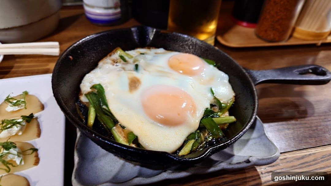 Eggs in Skillet with Greens