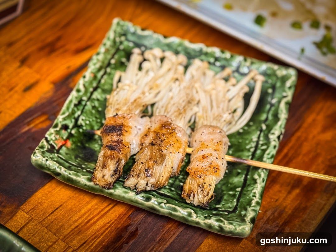Grilled Enoki Mushroom Skewers on Green Plate