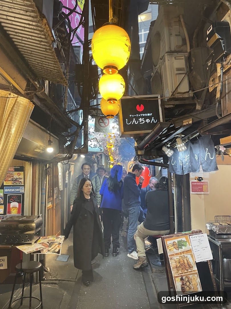 Night Street Scene with Lanterns and People