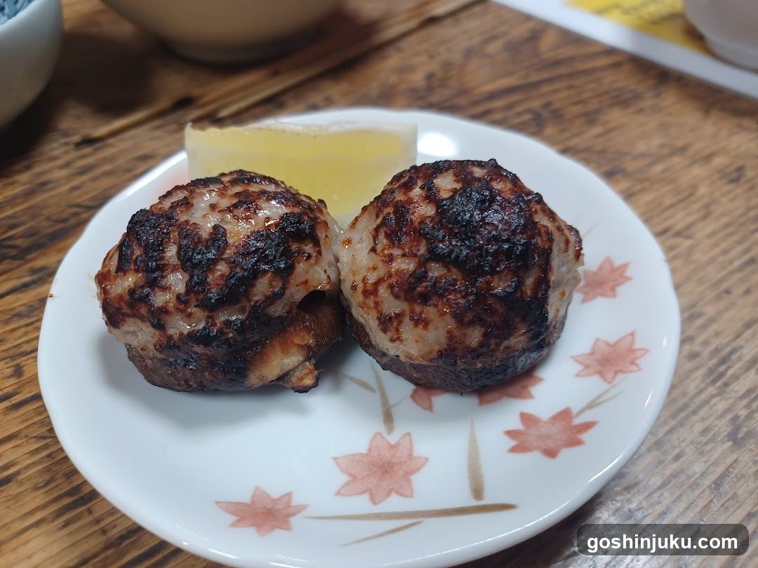 Grilled Meatballs with Lemon Wedge