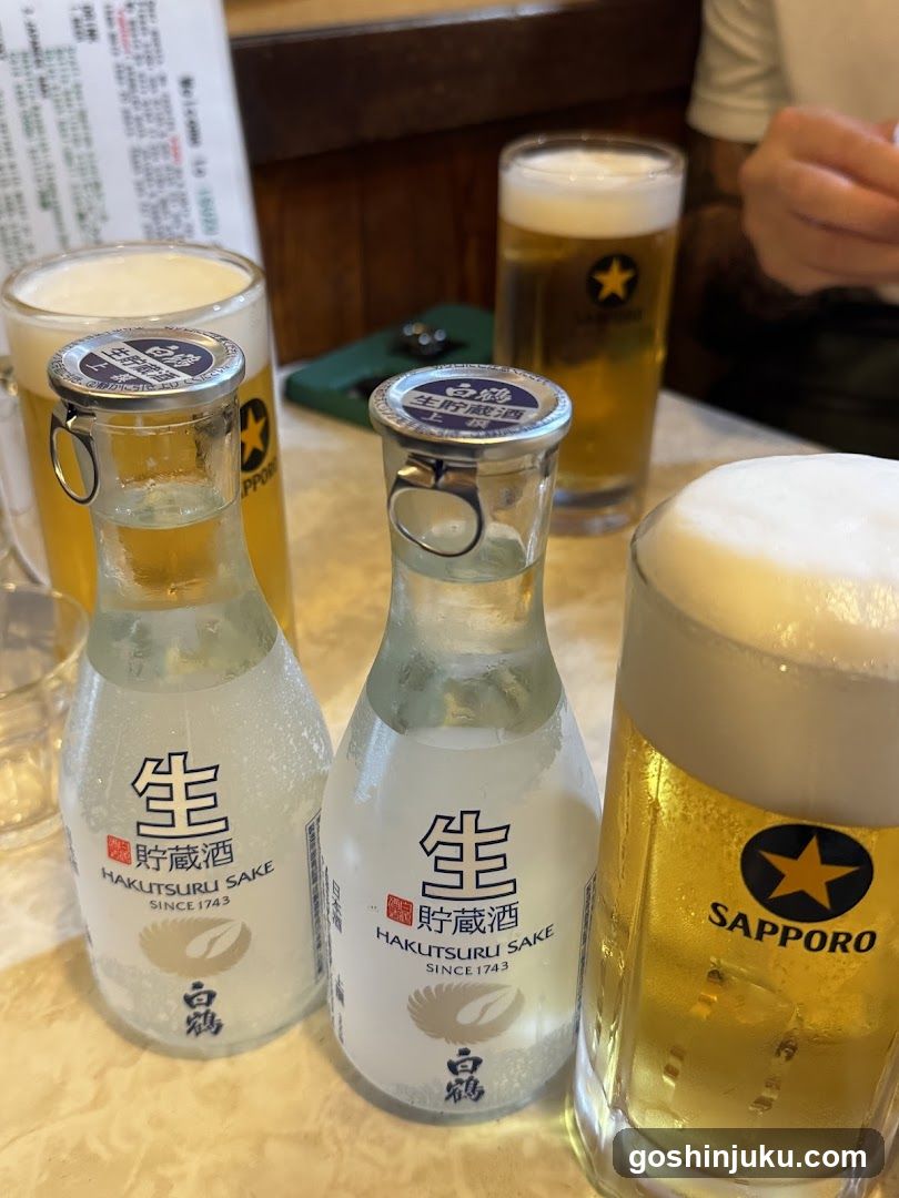 Bottled Sake and Beer on Table