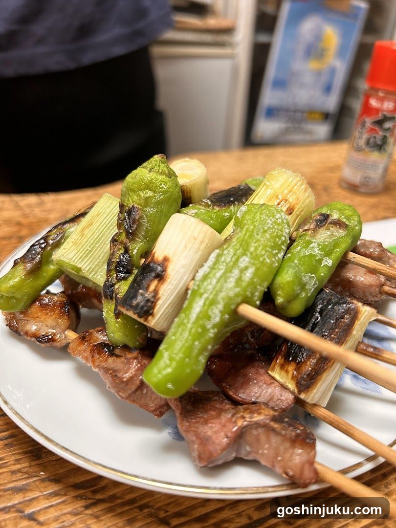 Grilled Skewers with Shishito Peppers and Scallions