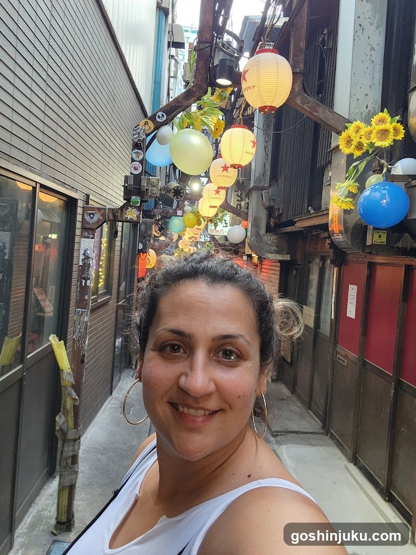 Woman in Alleyway with Lanterns