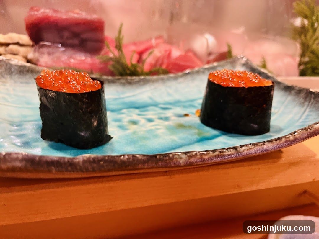 Sushi with Tobiko on Blue Plate