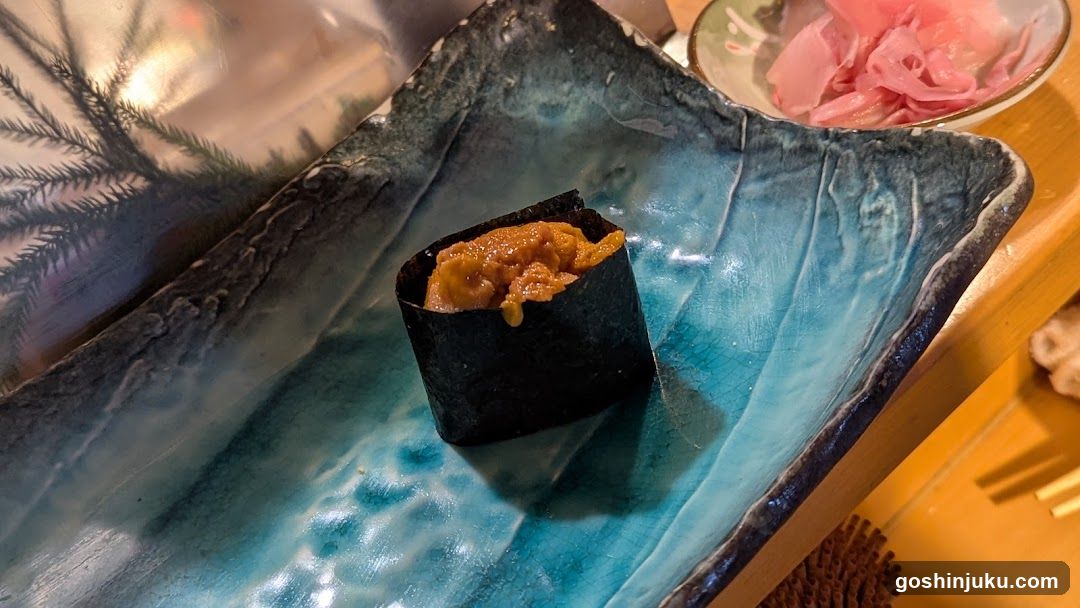Sushi on a blue ceramic plate