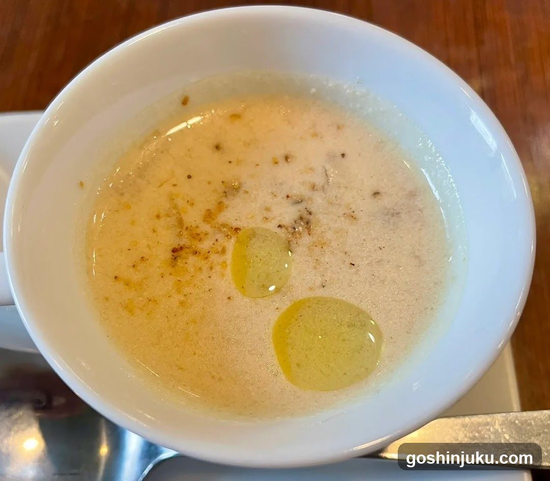 Bowl of creamy soup with oil drizzle