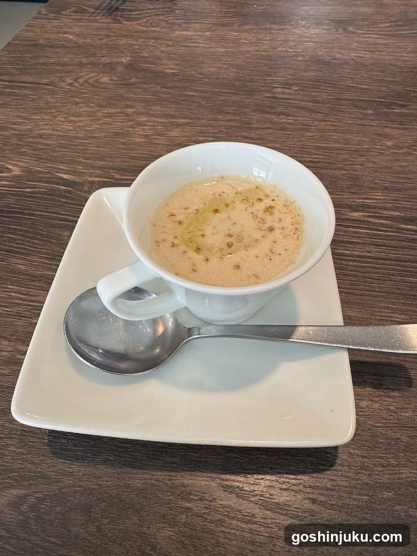 Bowl of Soup with Spoon