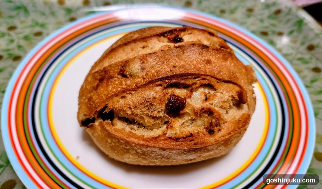 Baked Bread Roll on Colorful Plate
