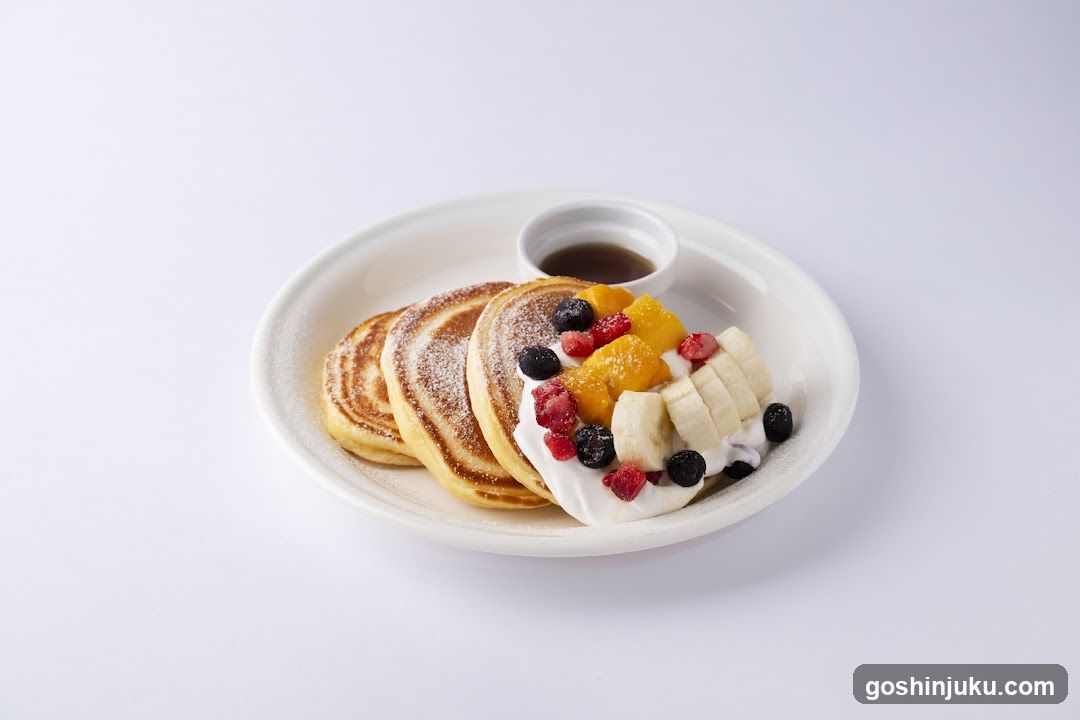 Fruit Topped Pancakes with Syrup