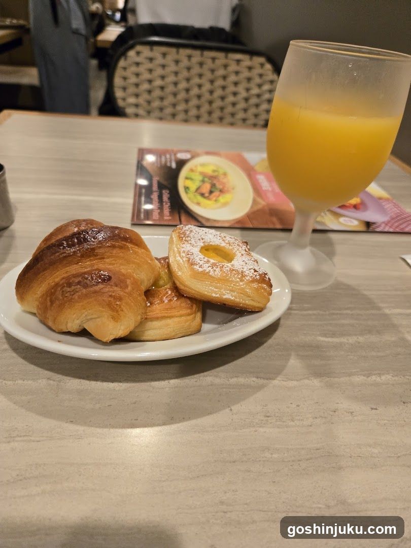 Breakfast with Croissant and Orange Juice