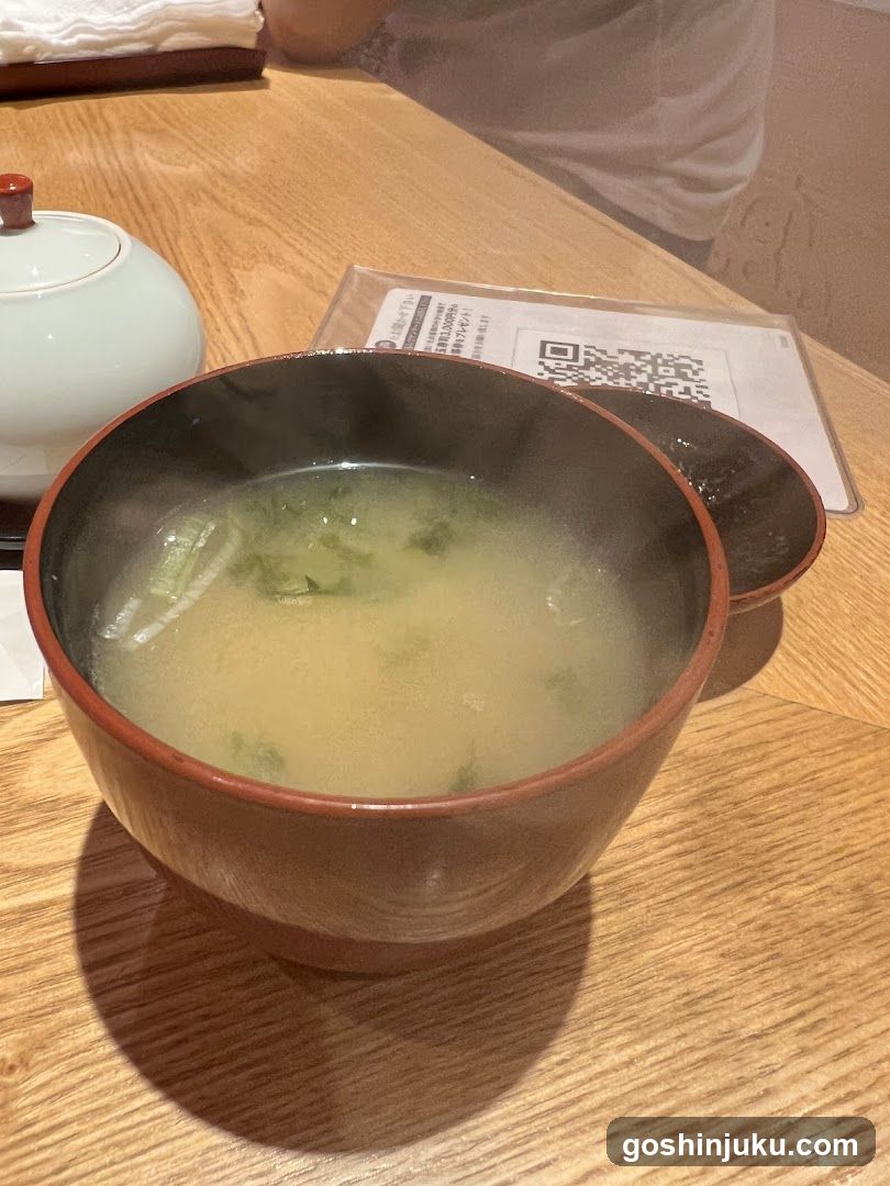 Bowl of Miso Soup on Wooden Table