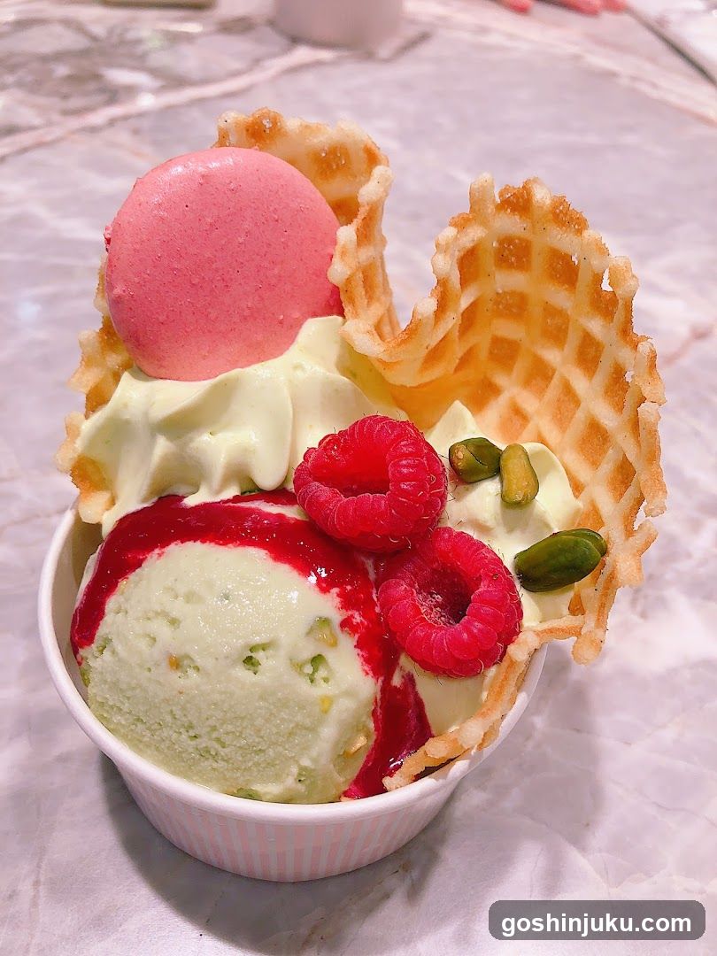 Delicious Ice Cream Bowl with Raspberries and Pistachios