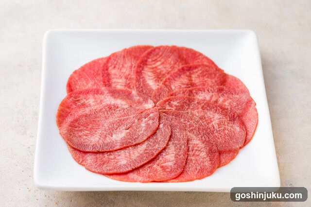 Sliced Meat on White Plate