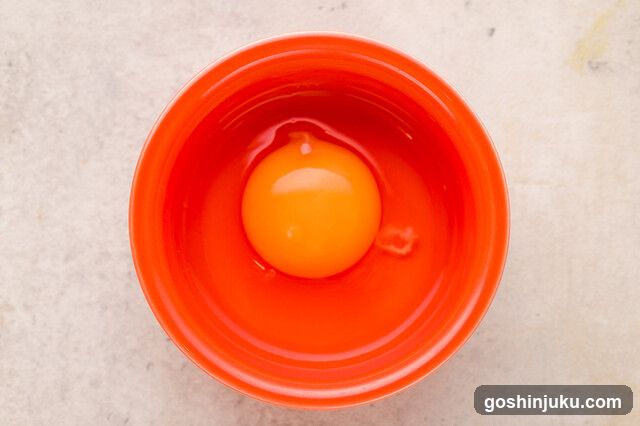 Raw Egg in Bowl