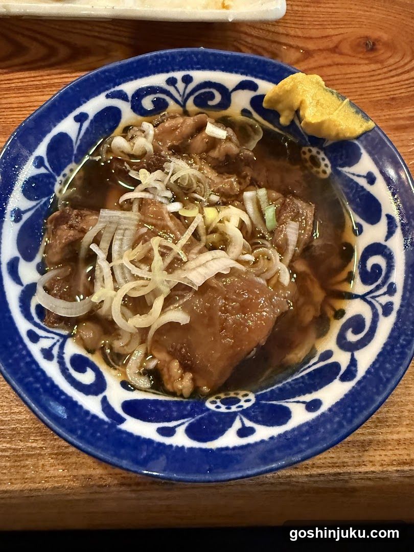 Bowl of Japanese-style stew with meat and onions