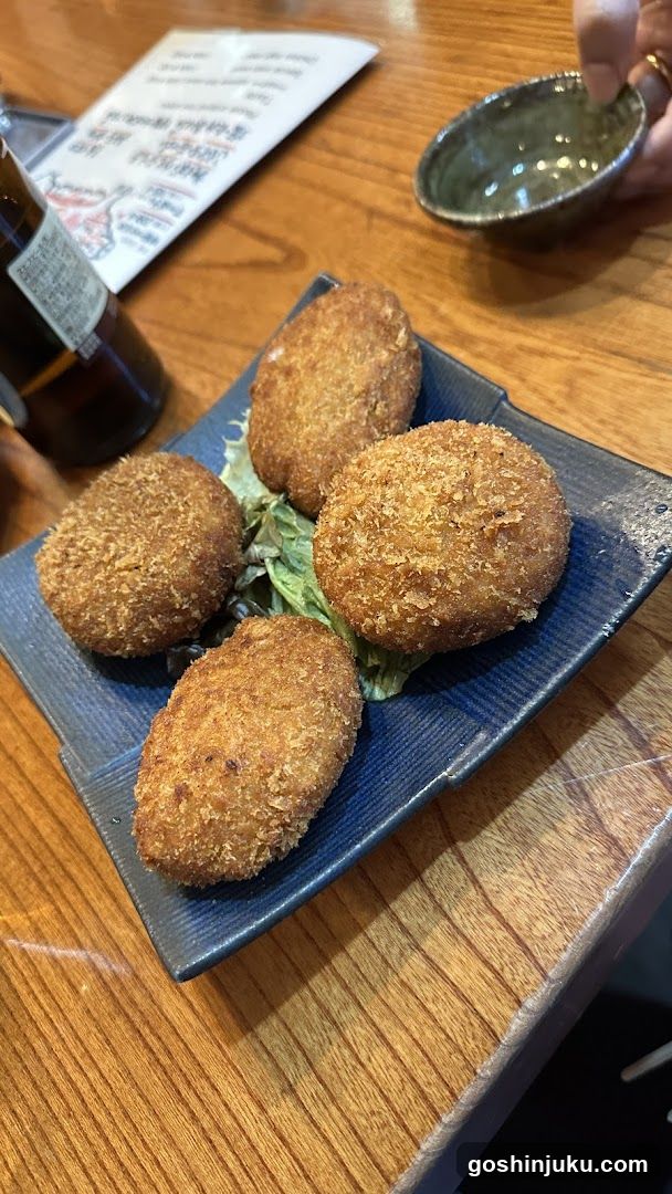 Crispy Fried Croquettes on Blue Plate