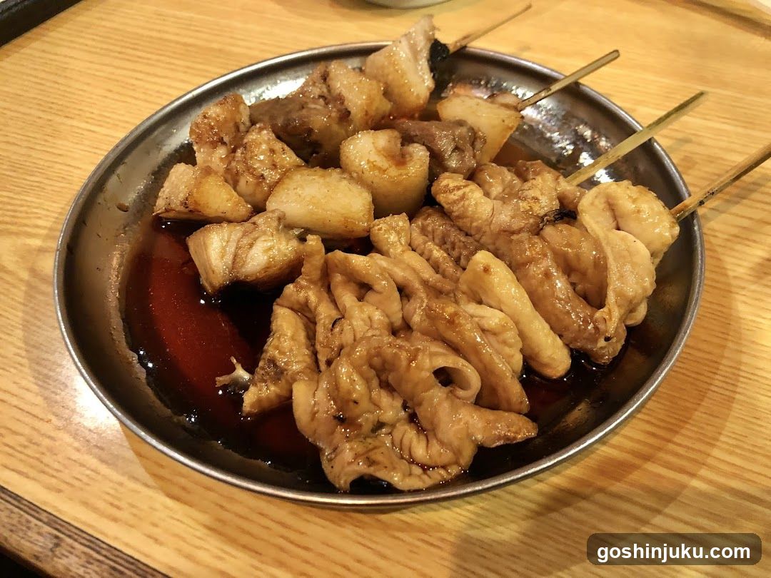 Grilled Meat Skewers on a Metal Plate