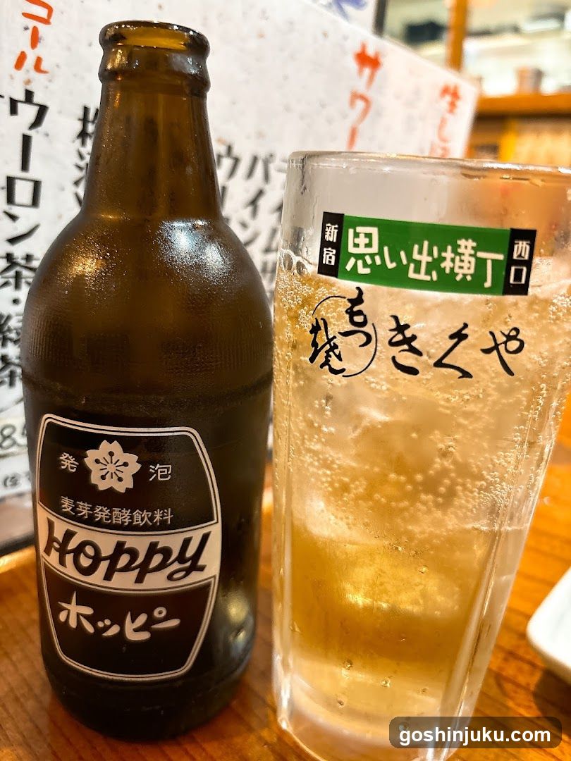 Beer bottle and glass with Japanese text
