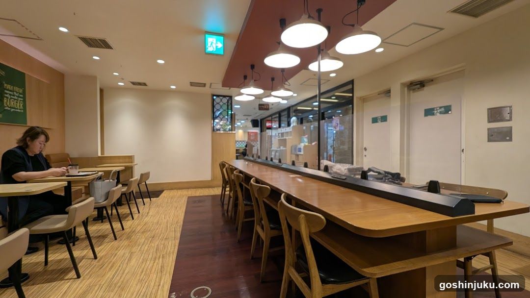 Restaurant Interior with Long Tables and Seating Area