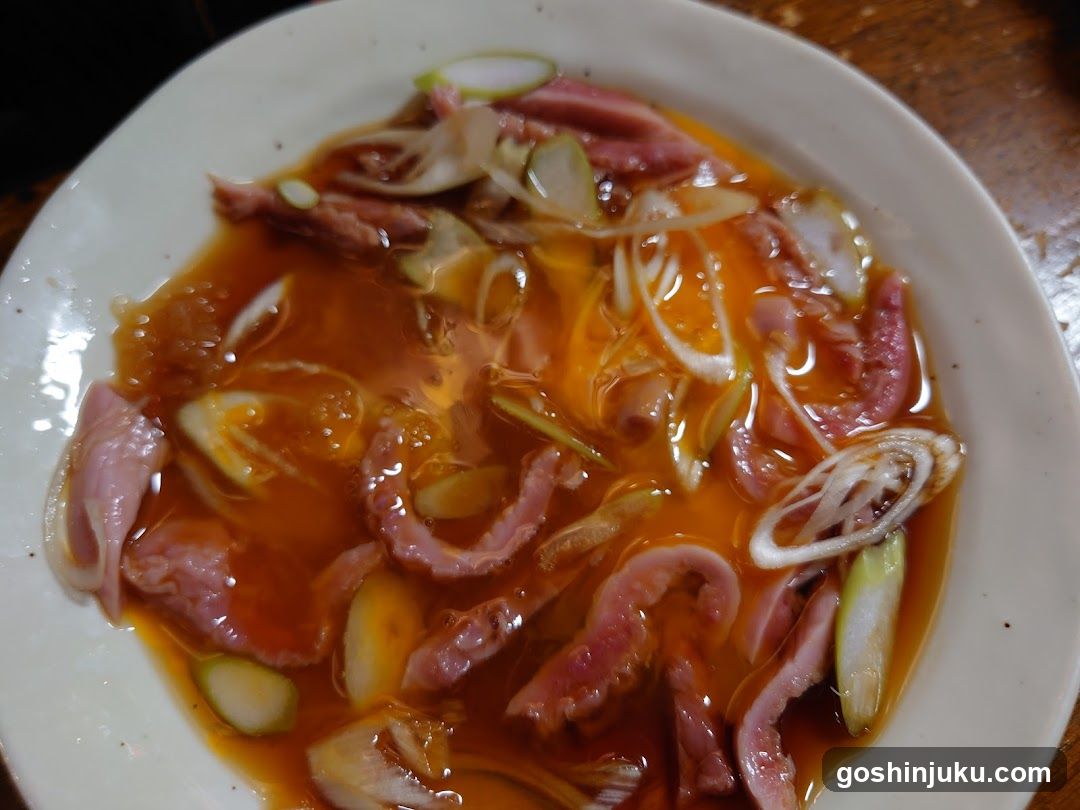 Sliced Meat in Broth with Scallions