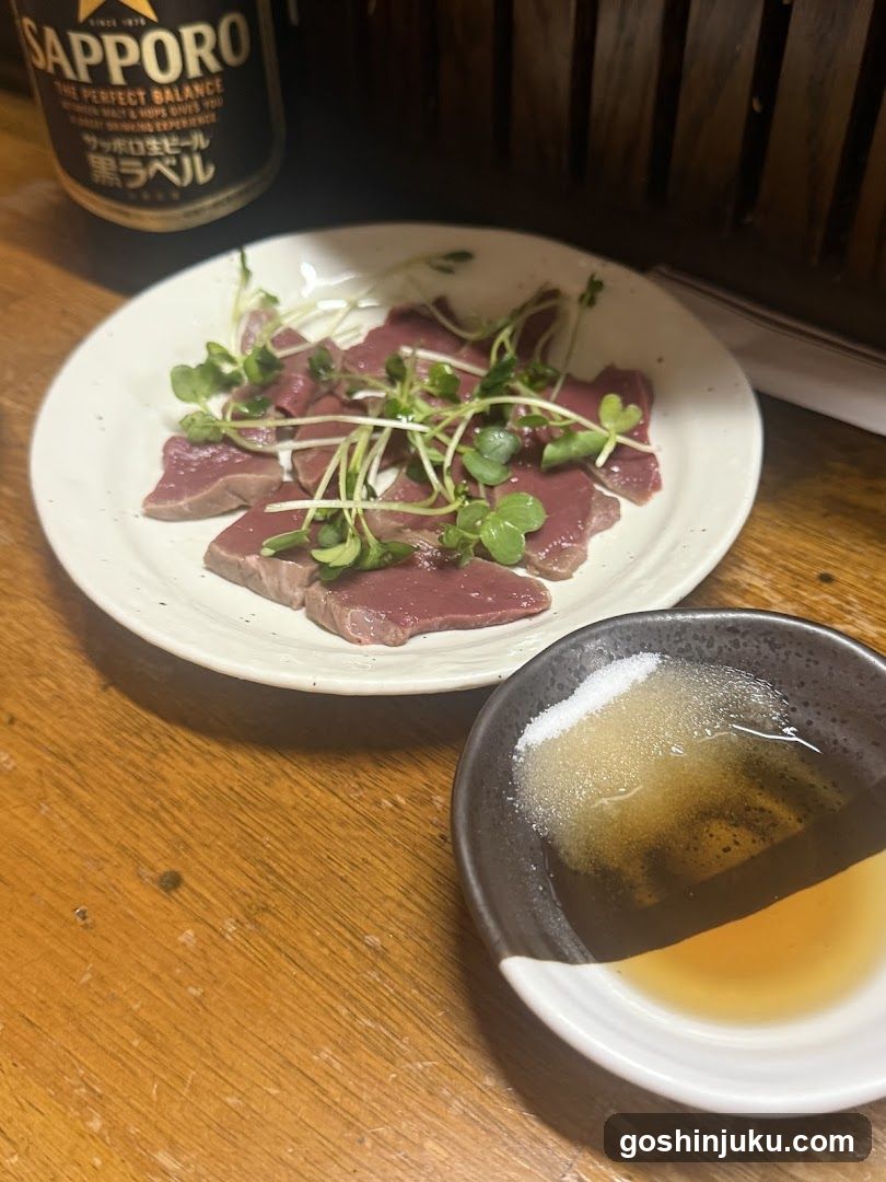 Sapporo Beer and Raw Beef Dish
