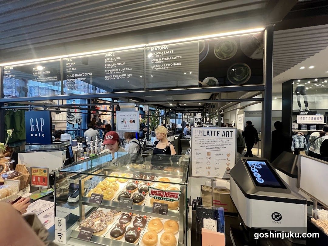 Cafe Interior with Donut Display and Menu Board