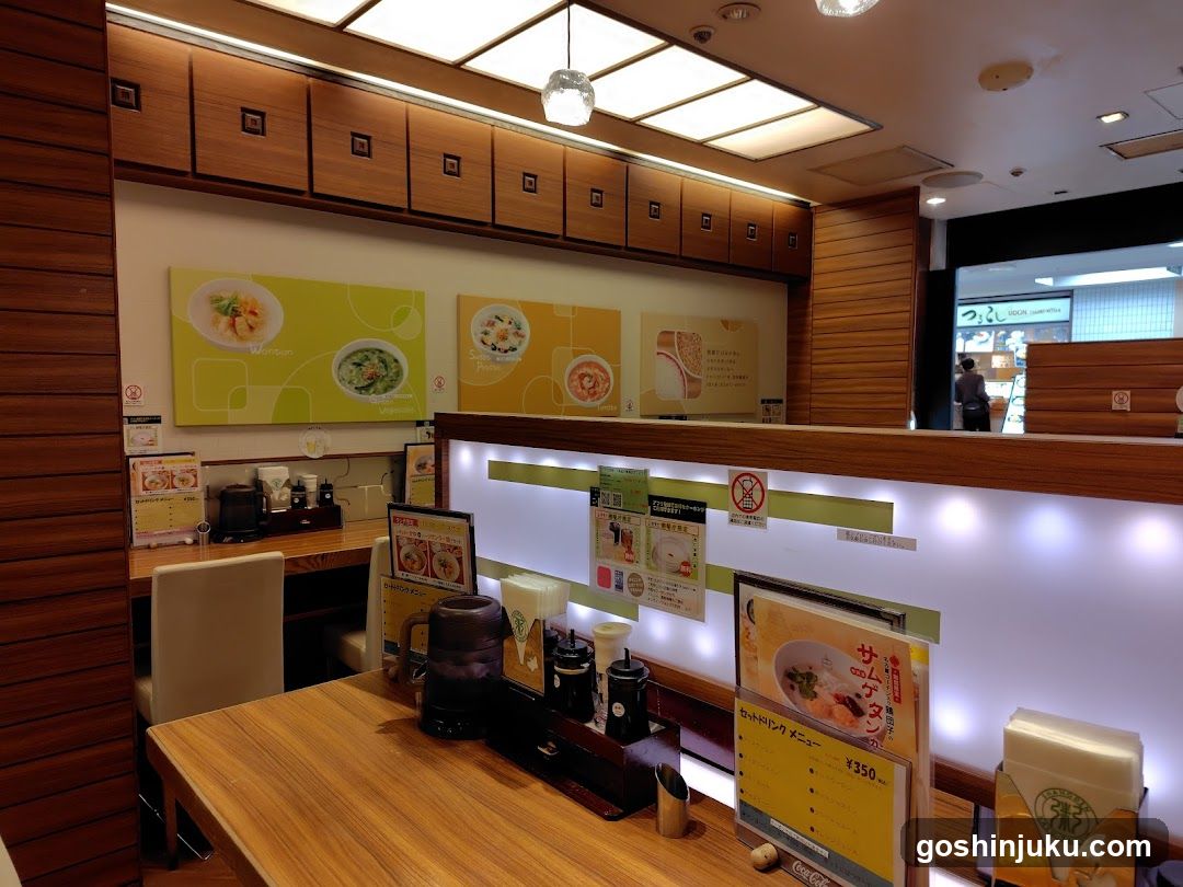 Restaurant Interior with Menu Boards and Condiments