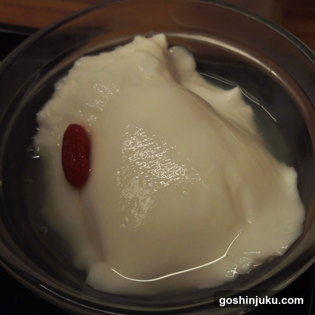 Dish in Bowl with Red Garnish