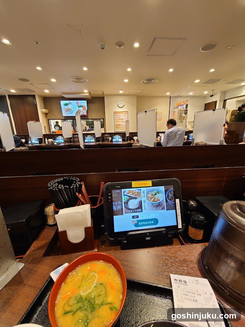 Restaurant Interior with Digital Menu and Soup Bowl