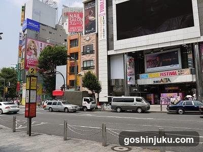 Urban Street Scene with Shops and Vehicles