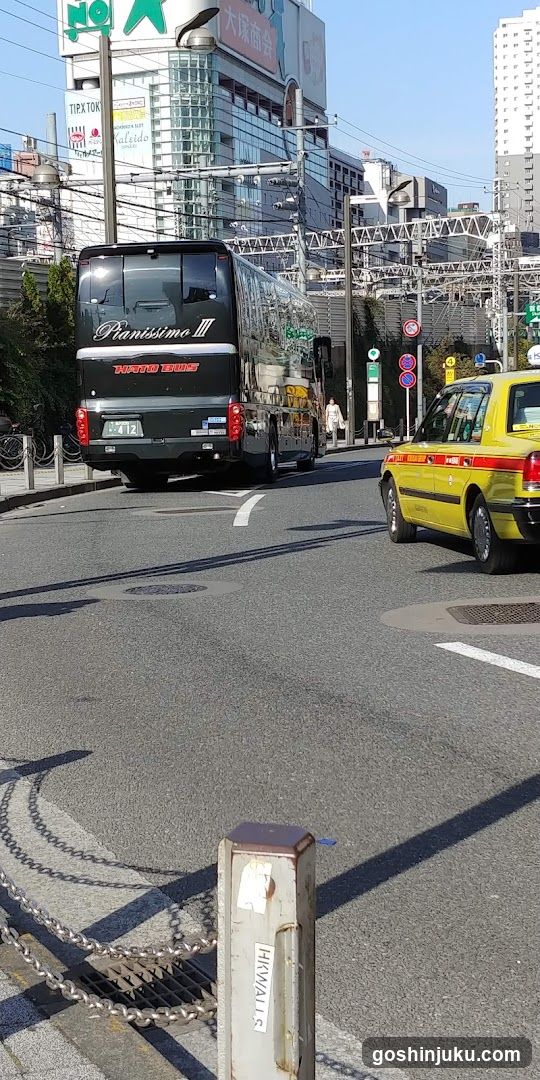 Street scene with bus and taxi
