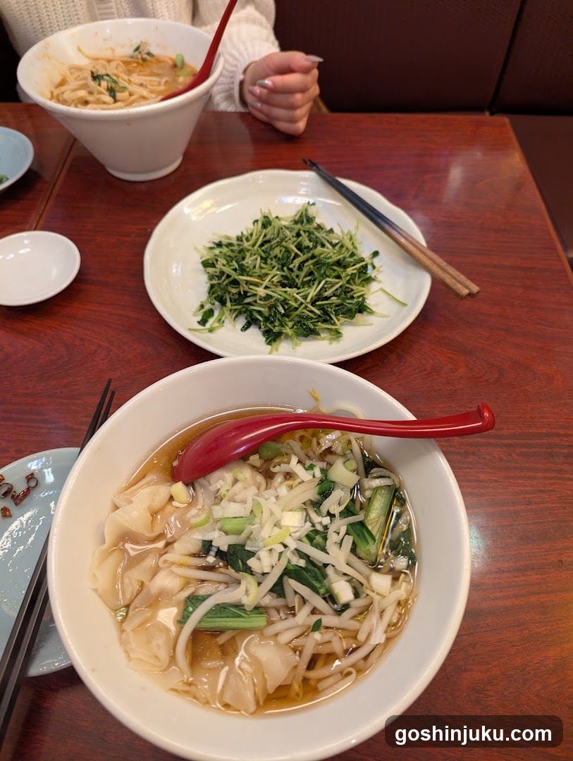 Dining Table with Noodles and Side Dish