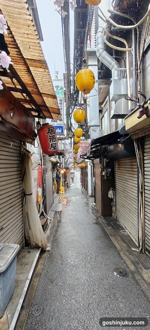 Narrow Alleyway with Yellow Lanterns