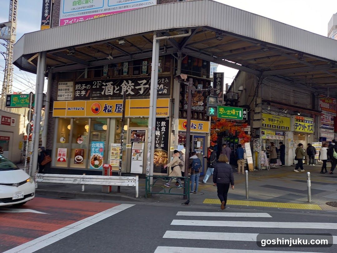 Street scene with shops and pedestrians