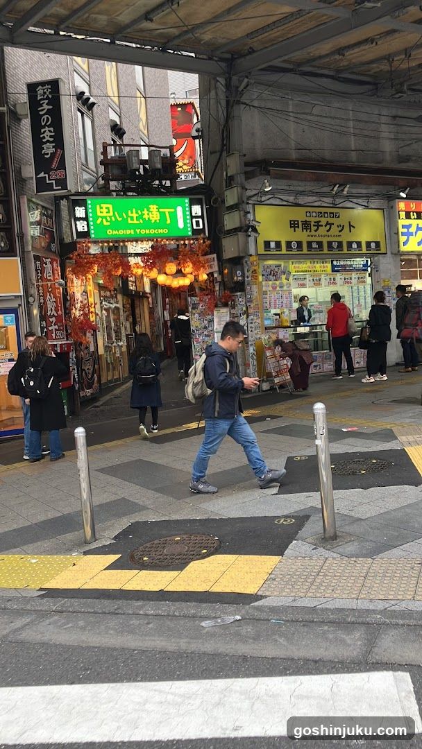 Street scene with pedestrians and shops