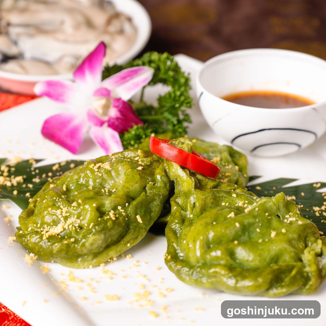 Green Dumplings with Red Pepper Garnish