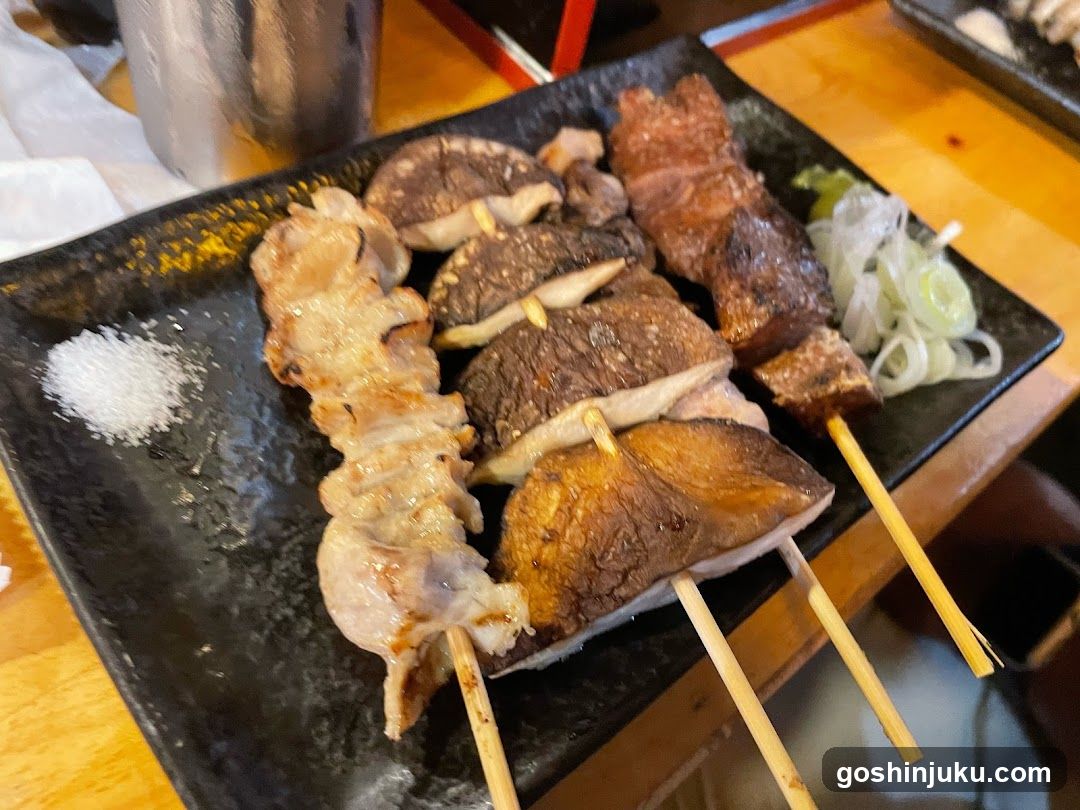 Grilled Skewers on Black Plate