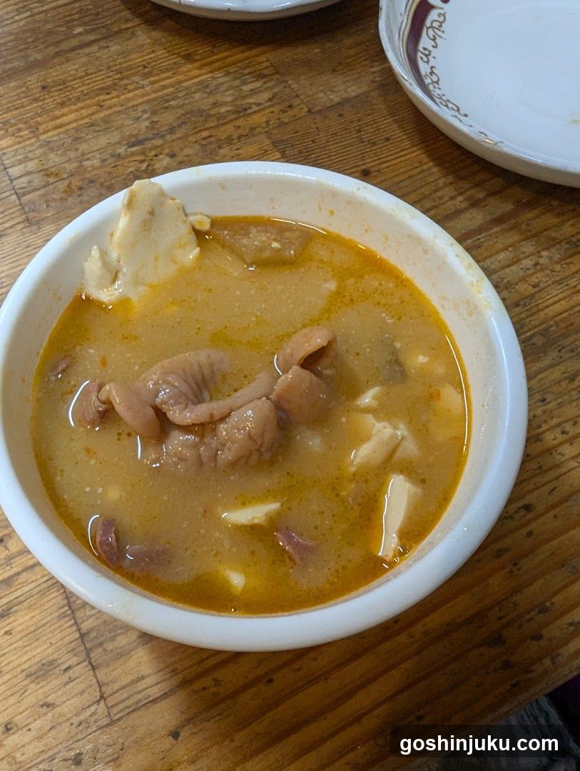 Bowl of Soup with Meat and Tofu