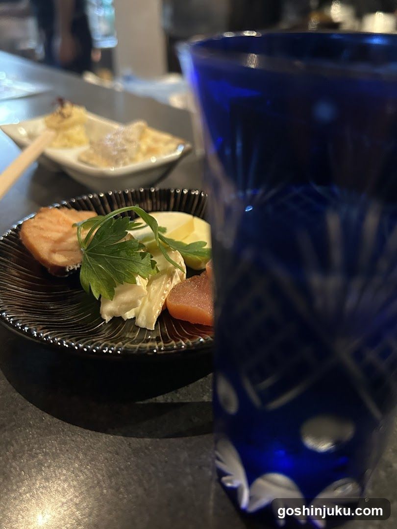 Sushi and Blue Glass Cup