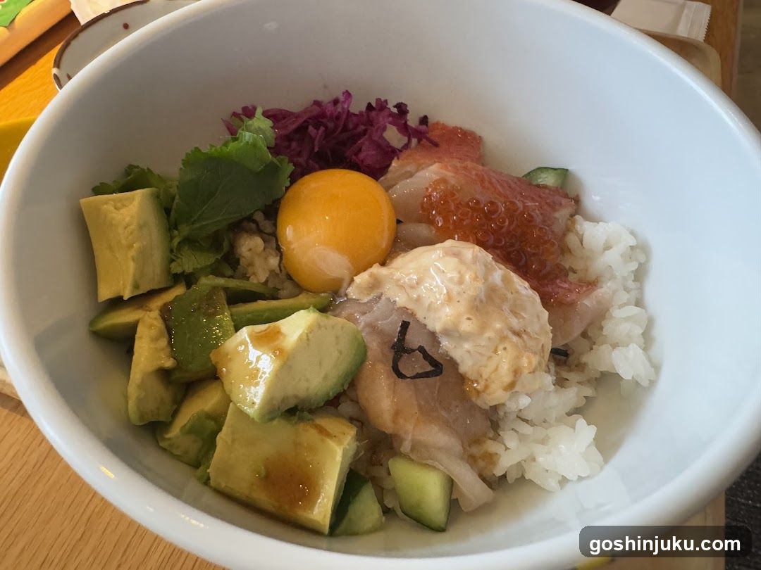 Bowl of Poke Rice with Avocado and Egg