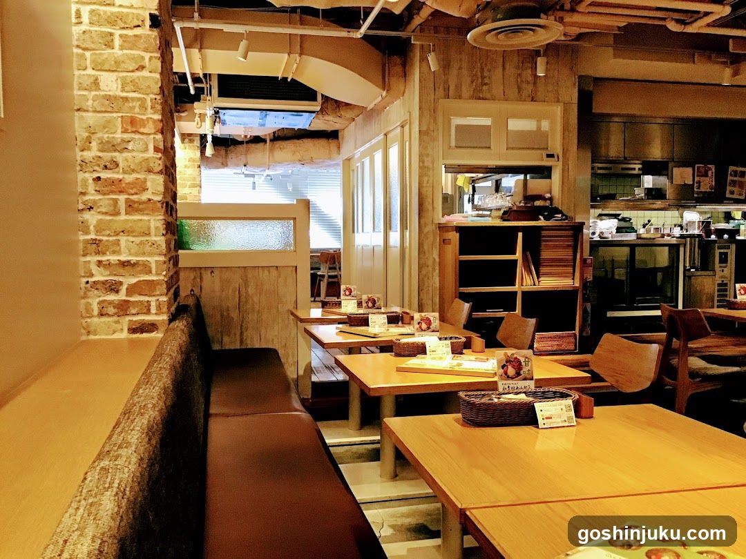 Restaurant Interior with Wooden Tables and Brick Wall