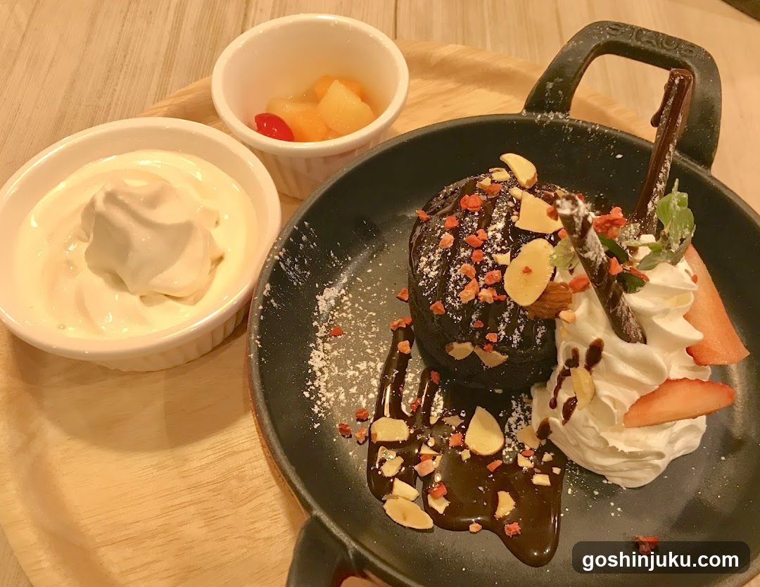 Chocolate Dessert with Whipped Cream and Fruit