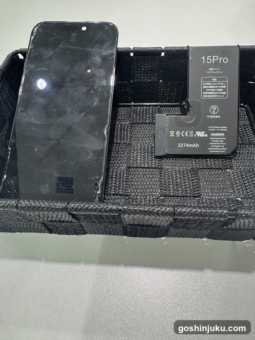 Damaged iPhone with Battery Pack