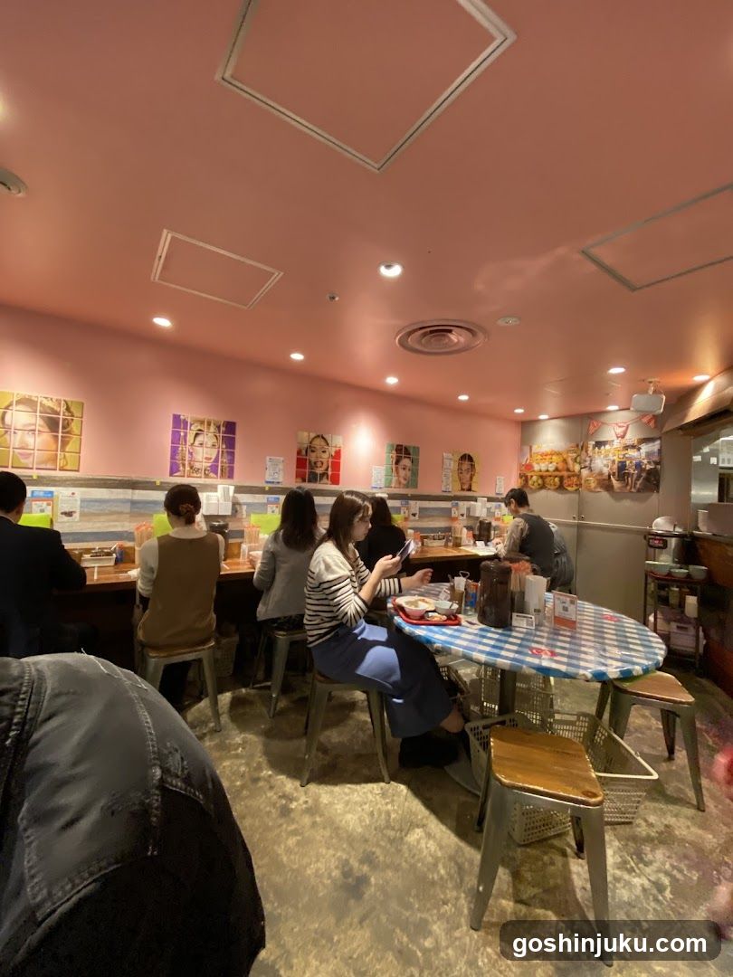 Dining Interior with Pink Walls and Checkered Table