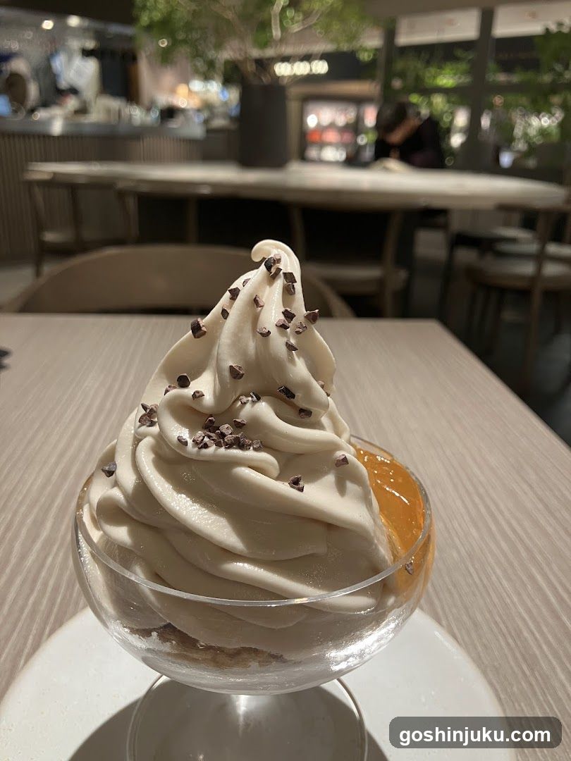 Soft-serve dessert in glass cup