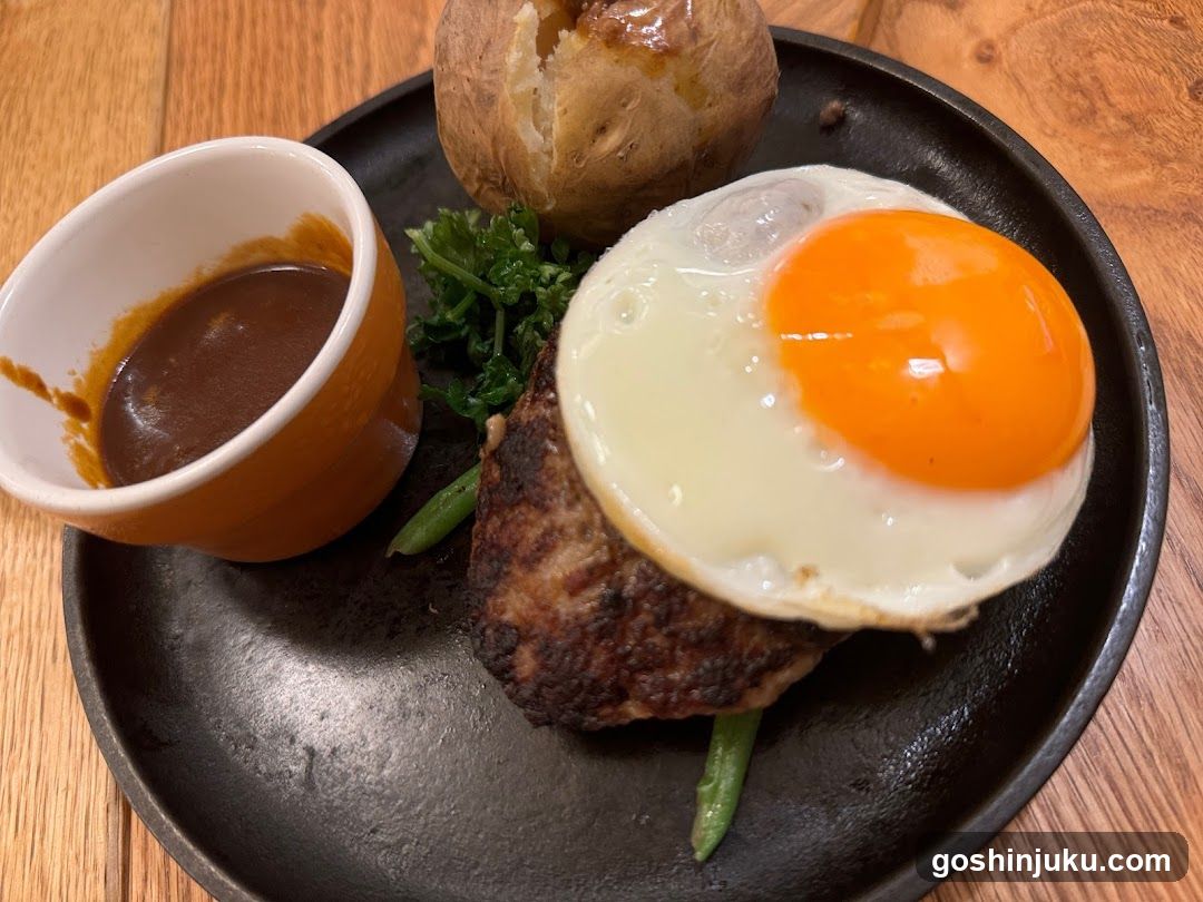 Fried Egg with Meat Patty and Side Dish