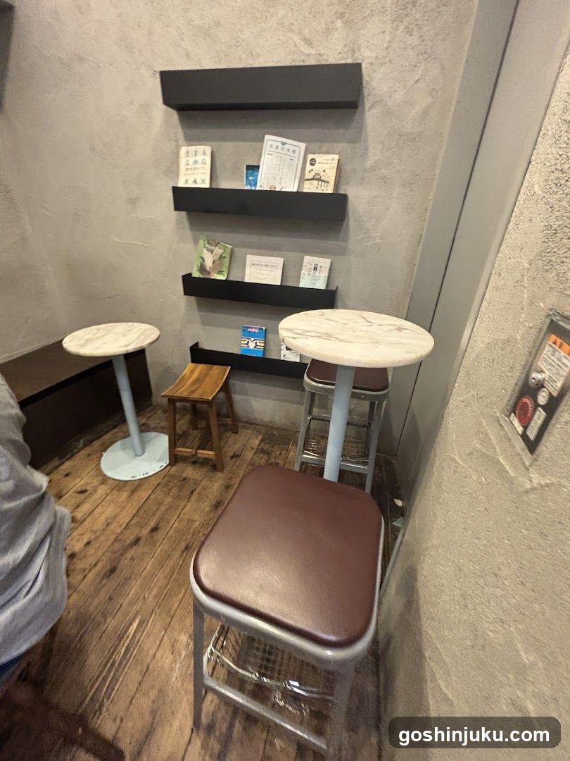Interior seating area with shelves and tables