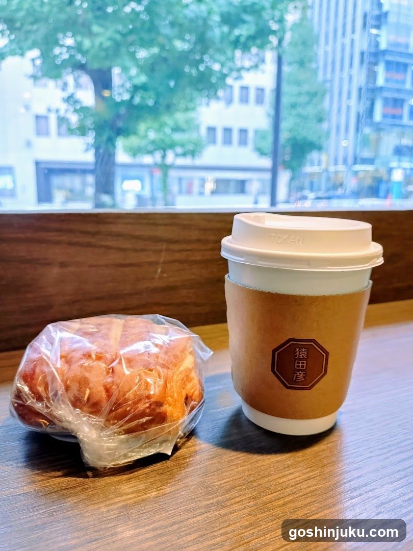 Coffee and Pastry on Wooden Table