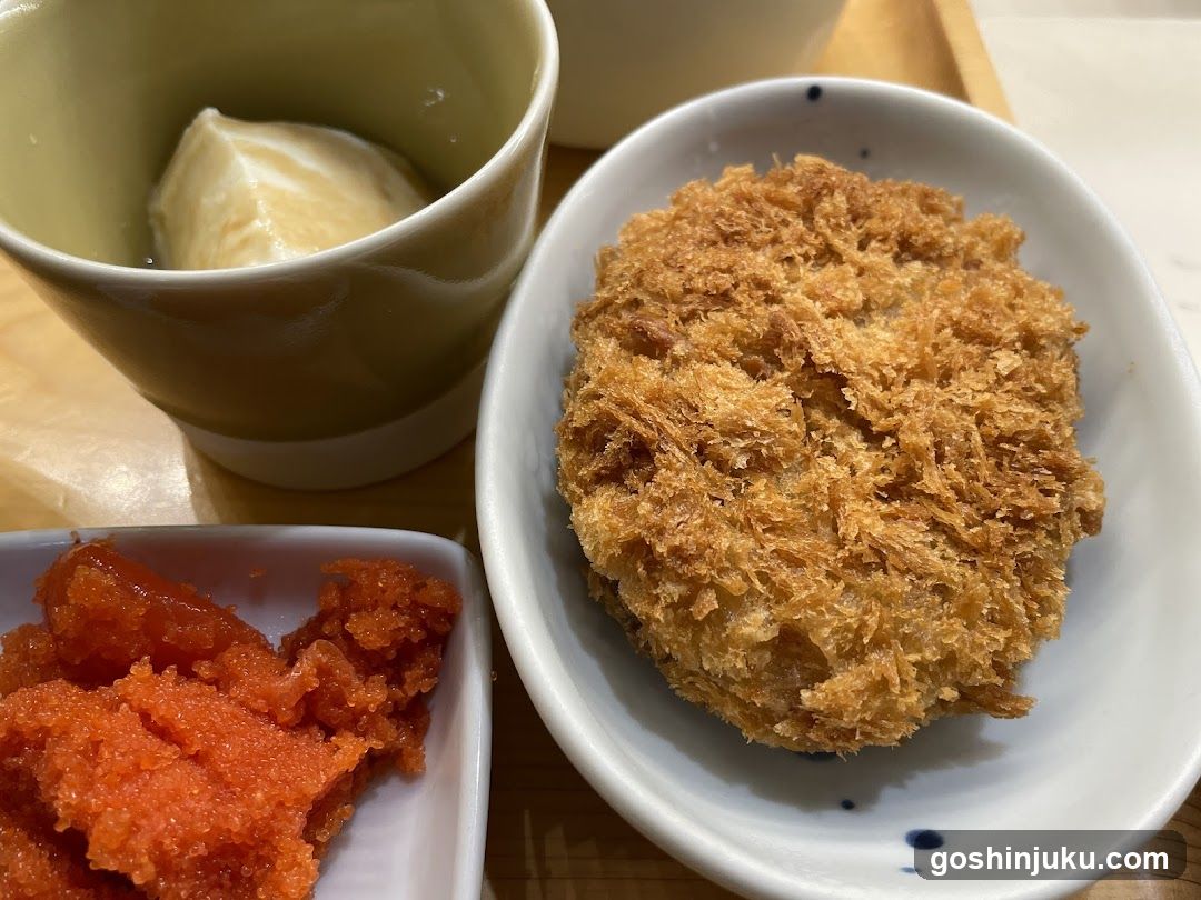 Breaded Food with Condiments